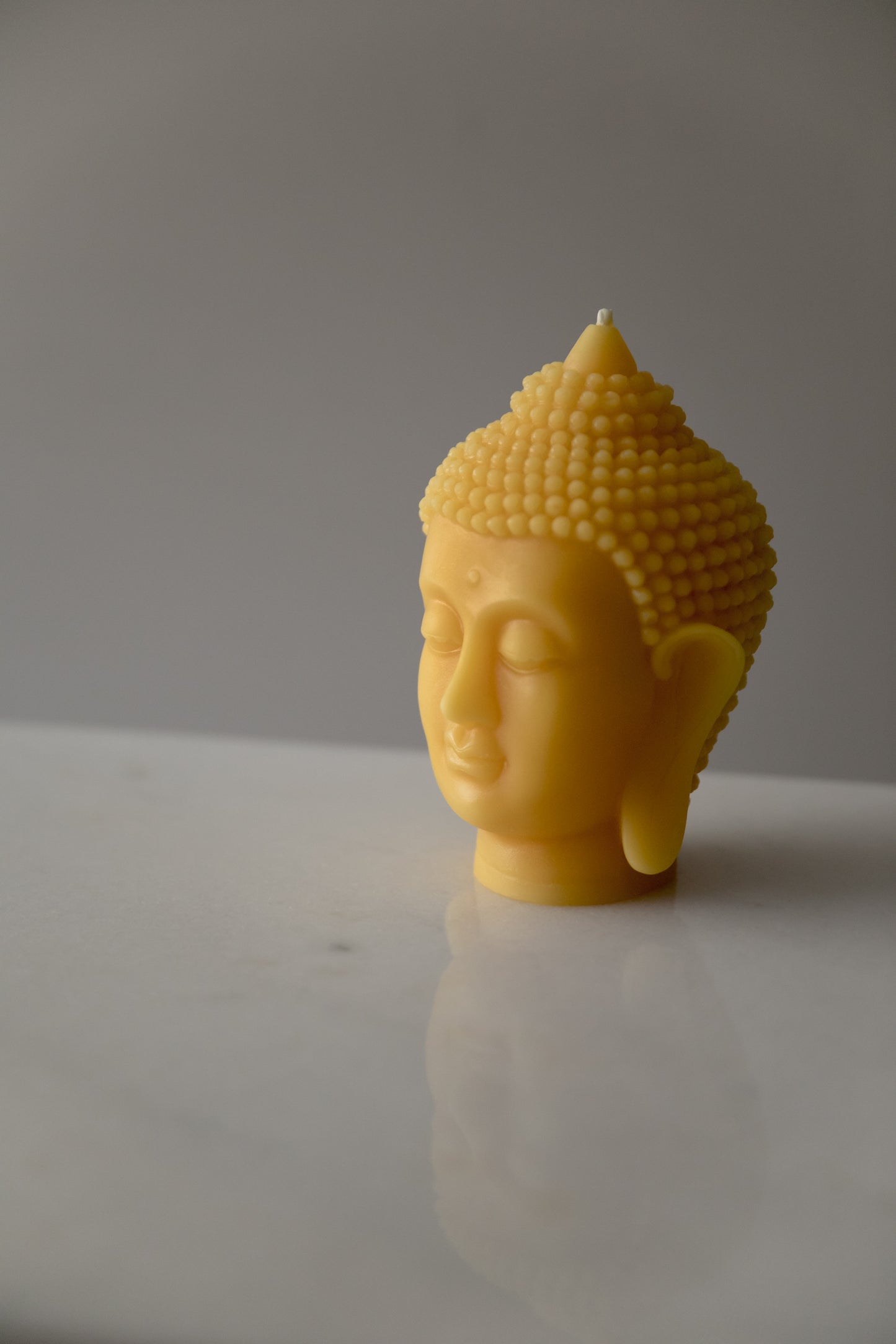 Buddha in pure beeswax form. A Candle made of only pure Canadian beeswax.